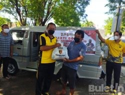 Kapolsek Benoa Serahkan Sembako Kepada Warga Dalam Menyambut HUT Bhayangkara 76