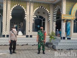 Sinergi Babinsa Kodim 0822 Bondowoso dan Bhabinkamtibmas Pengamanan Sholat Idul Adha