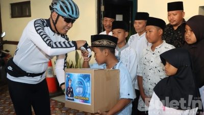 Berbagi Sesama Saat Gowes Barokah, Polres Tulungagung Bersama Kodim 0807 Santuni Anak Yatim