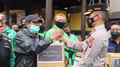 Pasca Kenaikan BBM, Polres Batu Berikan Bantuan Paket Sembako ke Puluhan Ojol