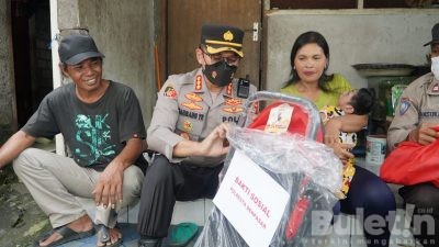 Kapolresta Denpasar Datangi Anak Penyandang Disabilitas Berikan Bantuan Stroller