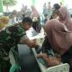Babinsa Petung Bondowoso Hadir di Posyandu, Dukung Pemantauan Kesehatan Balita Sejak Dini‎